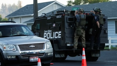 An armored police vehicle leaves an area where multiple firefighters were attacked when responding to a fire in the Canfield Mountain area outside Coeur d’Alene, Idaho, U.S. June 29, 2025. (REUTERS)