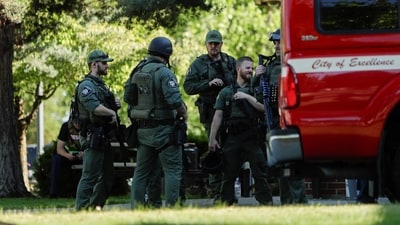 Two firefighters were killed and one was injured after an ambush during a fire response near Canfield Mountain; law enforcement gathered at Cherry Hill Park following the attack. REUTERS/Young Kwak (REUTERS)