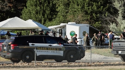 Law enforcement officers gather at Cherry Hill Park after multiple firefighters were attacked when responding to a fire in the Canfield Mountain area outside Coeur d’Alene, Idaho, U.S. June 29, 2025. (REUTERS)