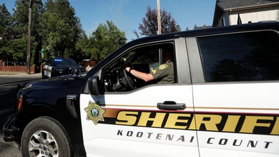 Kootenai County Sheriff's vehicle travels near an area where multiple firefighters were attacked when responding to a fire in the Canfield Mountain area outside Coeur d'Alene, Idaho, U.S. June 29, 2025.  REUTERS/Young Kwak (REUTERS)