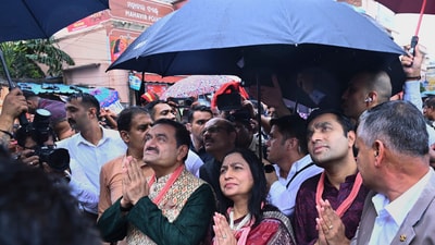 Indian industrialist Gautam Adani with his wife Priti Adani and son Karan Adani pray during annual Rath Yatra festival in Puri (AP) Indian industrialist Gautam Adani with his wife Priti Adani and son Karan Adani pray during annual Rath Yatra festival in Puri (AP)