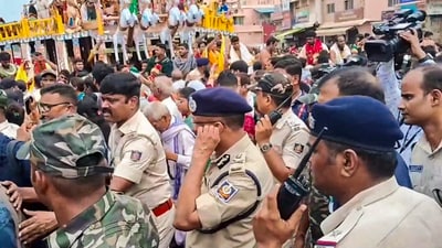 Puri: Police officials visit the site after a stampede near Shree Gundicha Temple, in Puri, Odisha, after three people were killed in a stampede (PTI) Puri: Police officials visit the site after a stampede near Shree Gundicha Temple, in Puri, Odisha, after three people were killed in a stampede (PTI)