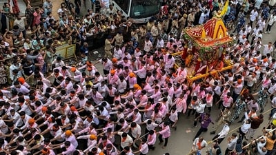 Devotees pull a chariot carrying the idols of Lord Jagannath, his brother Balabhadra and sister Subhadra during the Lord Jagannath Rath Yatra, an annual religious procession, in Ahmedabad on June 27, (AFP) Devotees pull a chariot carrying the idols of Lord Jagannath, his brother Balabhadra and sister Subhadra during the Lord Jagannath Rath Yatra, an annual religious procession, in Ahmedabad on June 27, (AFP)