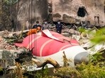 Wreckage of the crashed Air India plane being lifted through a crane, in Ahmedabad, Gujarat, on June 14, 2025. (PTI) Wreckage of the crashed Air India plane being lifted through a crane, in Ahmedabad, Gujarat, on June 14, 2025. (PTI)