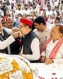 At the party headquarters in Lucknow, celebrations peaked as thousands of supporters gathered to greet the SP chief, who cut a 52-kg laddu cake. (Sourced) At the party headquarters in Lucknow, celebrations peaked as thousands of supporters gathered to greet the SP chief, who cut a 52-kg laddu cake. (Sourced)