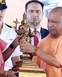 President Droupadi Murmu being felicitated by UP chief minister Yogi Adityanath during the inauguration of the Mahayogi Guru Gorakhnath Ayush University, in Gorakhpur on Tuesday. ((@myogiadityanath X/ANI Photo))