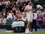 Taylor Fritz of the U.S. reacts after his first round match against France's Giovanni Mpetshi Perricard gets suspended