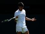 Carlos Alcaraz reacts in disbelief after losing a point vs Fabio Fognini.