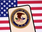 A Justice Department memo under the Trump administration aims to strip citizenship from naturalized Americans convicted of certain crimes, emphasizing civil denaturalization. REUTERS/Dado Ruvic/Illustration/File Photo