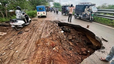 A road caved in near the dumping ground at Dadumajra after rain in Chandigarh on Tuesday. (Keshav Singh/HT) A road caved in near the dumping ground at Dadumajra after rain in Chandigarh on Tuesday. (Keshav Singh/HT)