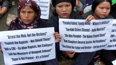 Kuki Women Organisation for Human Rights (KWOHR) organised a sit-in protest against the arrests of Kuki individuals. (ANI Grab File photo) Kuki Women Organisation for Human Rights (KWOHR) organised a sit-in protest against the arrests of Kuki individuals. (ANI Grab File photo)