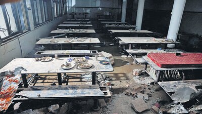 Debris at the BJ medical college hostel mess after the Air India aircraft crashed into the building, in Ahmedabad. (REUTERS) Debris at the BJ medical college hostel mess after the Air India aircraft crashed into the building, in Ahmedabad. (REUTERS)