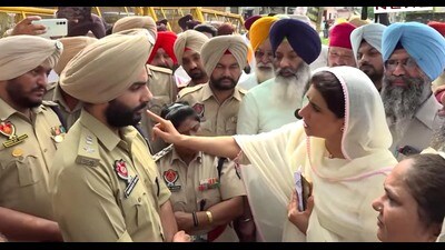 Ganieve Kaur Majithia, wife of SAD leader Bikram Singh Majithia, arguing with SSP (rural) Maninder Singh at Majithia on Tuesday. Ganieve Kaur Majithia, wife of SAD leader Bikram Singh Majithia, arguing with SSP (rural) Maninder Singh at Majithia on Tuesday.