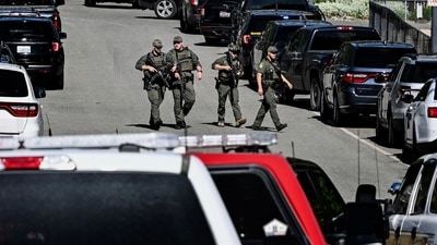 Police and fire crews respond to a shooting and fire on Canfield Mountain in Coeur d'Alene, Idaho, Sunday, June 29, 2025. (Kathy Plonka/The Spokesman-Review via AP) (AP) Police and fire crews respond to a shooting and fire on Canfield Mountain in Coeur d'Alene, Idaho, Sunday, June 29, 2025. (Kathy Plonka/The Spokesman-Review via AP) (AP)