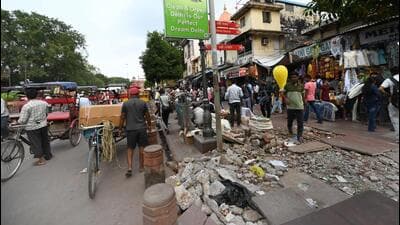 The stretch, a non-motorised and pedestrian-friendly space on paper, was serving as an illegal parking zone, HT found during a spot check on Tuesday. (Arvind Yadav/HT Photo) The stretch, a non-motorised and pedestrian-friendly space on paper, was serving as an illegal parking zone, HT found during a spot check on Tuesday. (Arvind Yadav/HT Photo)