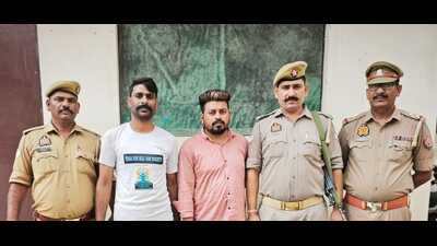Two accused in police custody of Mathura police on Tuesday (HT Photo) Two accused in police custody of Mathura police on Tuesday (HT Photo)