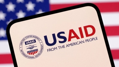USAID logo and US flag are seen in this illustration. (REUTERS)