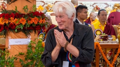 Actor Richard Gere arrives to attend an event to celebrate the 90th birthday of Tibetan spiritual leader the Dalai Lama. AP/PTI(AP06_30_2025_000149A) (AP) Actor Richard Gere arrives to attend an event to celebrate the 90th birthday of Tibetan spiritual leader the Dalai Lama. AP/PTI(AP06_30_2025_000149A) (AP)