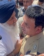 A Punjab Police personnel taking Shiromani Akali Dal chief Sukhbir Singh Badal into preventive custody near Gurdwara Amb Sahib in Mohali on Wednesday. (HT Photo) A Punjab Police personnel taking Shiromani Akali Dal chief Sukhbir Singh Badal into preventive custody near Gurdwara Amb Sahib in Mohali on Wednesday. (HT Photo)