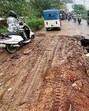 A road caved in near the dumping ground at Dadumajra after rain in Chandigarh on Tuesday. (Keshav Singh/HT)