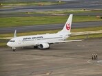 A Boeing Co. 737-846 aircraft operated by Japan Airlines is seen on the tarmac.