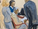 Sean 'Diddy' Combs, center, reads a jury note with his defense attorneys during jury deliberations for his sexual misconduct trial in Manhattan federal court, Monday, June 30, 2025, in New York. 