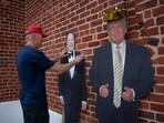 A fan of President Donald Trump adjusts a cut-out of Elon Musk at a "Trump-A-Palooza" event on June 21, 2025 in Brevard, North Carolina. A fan of President Donald Trump adjusts a cut-out of Elon Musk at a "Trump-A-Palooza" event on June 21, 2025 in Brevard, North Carolina.