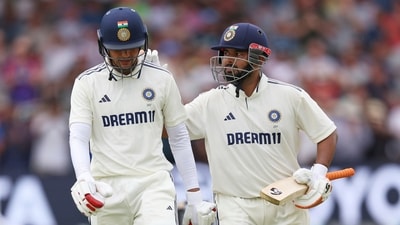 India's captain Shubman Gill walks off the field after losing his wicket as he receives a pat from batting partner Rishabh Pant on day two of the first Test (AP) India's captain Shubman Gill walks off the field after losing his wicket as he receives a pat from batting partner Rishabh Pant on day two of the first Test (AP)