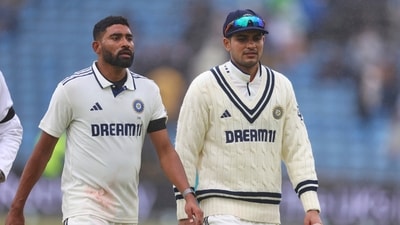India's Mohammed Siraj, left, and captain Shubman Gill leave the field after rain stopped play on day five of the first Test (AP) India's Mohammed Siraj, left, and captain Shubman Gill leave the field after rain stopped play on day five of the first Test (AP)