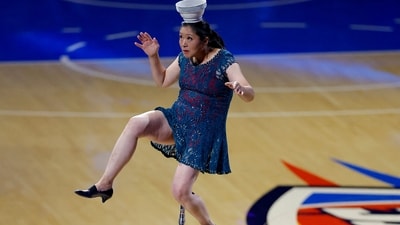Rong Niu, known as Red Panda, suffers an injury during the halftime show. Mandatory Credit: Alonzo Adams-Imagn Images (IMAGN IMAGES via Reuters Connect)