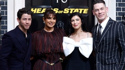 Nick Jonas, from left, Priyanka Chopra, Shay Shariatzadeh and John Cena pose at the premiere for the film 'Heads of State'. (Millie Turner/Invision/AP) Nick Jonas, from left, Priyanka Chopra, Shay Shariatzadeh and John Cena pose at the premiere for the film 'Heads of State'. (Millie Turner/Invision/AP)