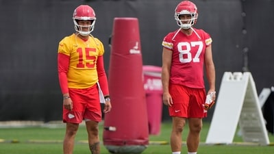 Kansas City Chiefs quarterback Patrick Mahomes (15) and tight end Travis Kelce (87) stretch during the NFL football team's practice Wednesday, June 18, 2025, in Kansas City, Mo. (AP Photo/Charlie Riedel) (AP) Kansas City Chiefs quarterback Patrick Mahomes (15) and tight end Travis Kelce (87) stretch during the NFL football team's practice Wednesday, June 18, 2025, in Kansas City, Mo. (AP Photo/Charlie Riedel) (AP)