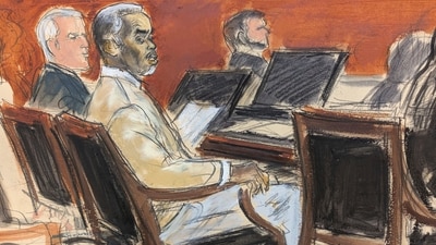 Sean ' Diddy' Combs, second from left, watches from the defense table as Judge Arun Subramanian speaks to the jury (AP)