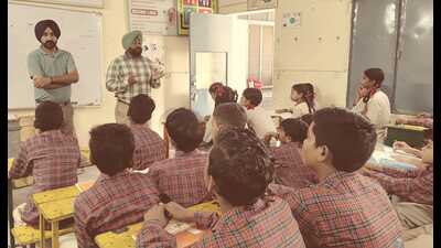 District information officer Parminder Singh and district BCC coordinator Barjinder Singh Brar making students aware about the prevention of dengue at Government High School Barewal on Wednesday. (HT Photo) District information officer Parminder Singh and district BCC coordinator Barjinder Singh Brar making students aware about the prevention of dengue at Government High School Barewal on Wednesday. (HT Photo)