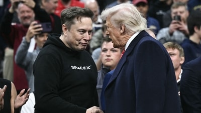 Tesla and SPaceX CEO Elon Musk (L) and US President Donald Trump shake hands as they attend the men's NCAA wrestling competition at the Wells Fargo Center in Philadelphia. (AFP) Tesla and SPaceX CEO Elon Musk (L) and US President Donald Trump shake hands as they attend the men's NCAA wrestling competition at the Wells Fargo Center in Philadelphia. (AFP)