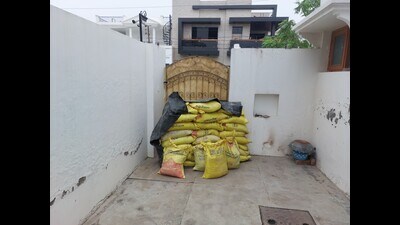 Patiala residents, who suffered losses in the 2023 floods, have already started taking precautionary measures. Many have shifted their furniture and other items to the roof, while some have readied sandbags and constructed brick walls to block the floodwater from entering their houses. (HT Photo) Patiala residents, who suffered losses in the 2023 floods, have already started taking precautionary measures. Many have shifted their furniture and other items to the roof, while some have readied sandbags and constructed brick walls to block the floodwater from entering their houses. (HT Photo)