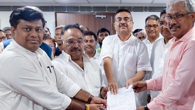 Rajya Sabha MP Samik Bhattacharya (2nd from left) files his nomination for the post of West Bengal BJP president in the presence of Union MoS and current state party chief Sukanta Majumdar, LoP in the West Bengal legislative assembly Suvendu Adhikari and others in Kolkata on Wednesday. (ANI) Rajya Sabha MP Samik Bhattacharya (2nd from left) files his nomination for the post of West Bengal BJP president in the presence of Union MoS and current state party chief Sukanta Majumdar, LoP in the West Bengal legislative assembly Suvendu Adhikari and others in Kolkata on Wednesday. (ANI)