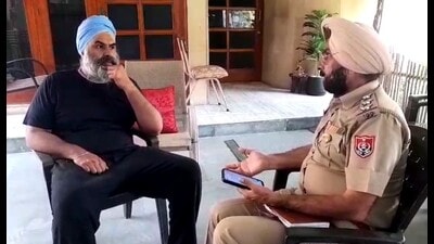 SAD leader Maheshinder Singh Grewal’s son, Hitesh Singh Grewal talking to a police official at their house in Ludhiana on Wednesday. (HT Photo) SAD leader Maheshinder Singh Grewal’s son, Hitesh Singh Grewal talking to a police official at their house in Ludhiana on Wednesday. (HT Photo)