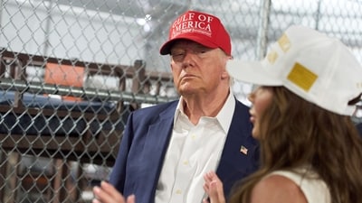 President Donald Trump listens as Homeland Security Secretary Kristi Noem speaks during a tour of "Alligator Alcatraz," a new migrant detention facilit. (AP) President Donald Trump listens as Homeland Security Secretary Kristi Noem speaks during a tour of "Alligator Alcatraz," a new migrant detention facilit. (AP)