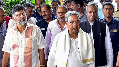 Karnataka chief minister Siddaramaiah, deputy chief minister DK Shivakumar, with Congress MLAs in Bengaluru. (PTI) Karnataka chief minister Siddaramaiah, deputy chief minister DK Shivakumar, with Congress MLAs in Bengaluru. (PTI)
