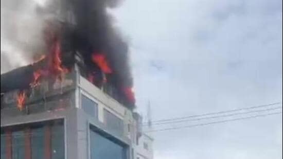 Preliminary investigations suggest that a blast in an air conditioner may have sparked the fire, though the exact cause has not yet been confirmed. (video grab)
