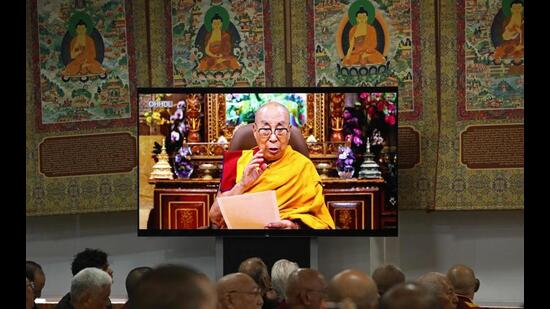 Tibetan spiritual leader the Dalai Lama speaks in a video broadcast at the start of the 15th Tibetan Religious Conference, a meeting of religious leaders in McLeodganj, near Dharamsala on Wednesday. Exiled Tibetan spiritual leader the Dalai Lama said on July 2, that the 600-year-old institution will continue after his death, a decision that will have profound impact on his Buddhist followers. (AFP Photo)