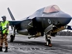 The Central Industrial Security Force (CISF) secures the Royal Navy F-35B fighter jet after its emergency landing, at Thiruvananthapuram International Airport. The Central Industrial Security Force (CISF) secures the Royal Navy F-35B fighter jet after its emergency landing, at Thiruvananthapuram International Airport.