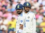 India's Virat Kohli (L) and Shubman Gill (R)
