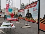 A view shows flowers placed on a table in front of a board with a photograph of Major General Mikhail Gudkov, the deputy head of the Russian Navy, in the far eastern city of Vladivostok, Russia, July 3, 2025.