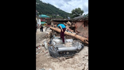 Car damaged in Thunag in Seraj area of Mandi district on Thursday. (Birbal Sharma/HT) Car damaged in Thunag in Seraj area of Mandi district on Thursday. (Birbal Sharma/HT)