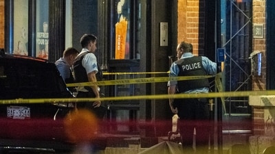 Chicago police investigate the scene of a shooting that took place at Artis Restaurant and Lounge located on Chicago Avenue in the River North neighborhood, Thursday, July 3, 2025. (Tyler Pasciak LaRiviere/Chicago Sun-Times via AP) (AP) Chicago police investigate the scene of a shooting that took place at Artis Restaurant and Lounge located on Chicago Avenue in the River North neighborhood, Thursday, July 3, 2025. (Tyler Pasciak LaRiviere/Chicago Sun-Times via AP) (AP)