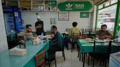 People dine at Ravi restaurant in Satwa district of Dubai, United Arab Emirates, Monday, June 9, 2025. (AP) People dine at Ravi restaurant in Satwa district of Dubai, United Arab Emirates, Monday, June 9, 2025. (AP)