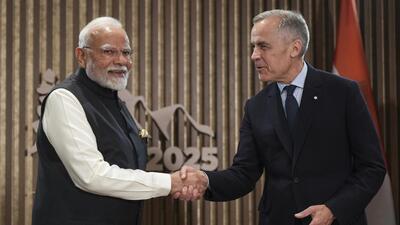 India's Prime Minister Narendra Modi (left) and Canada's Prime Minister Mark Carney shake hands during a meeting at the G7 Summit in Kananaskis, Alberta, on June 17. (AP) India's Prime Minister Narendra Modi (left) and Canada's Prime Minister Mark Carney shake hands during a meeting at the G7 Summit in Kananaskis, Alberta, on June 17. (AP)