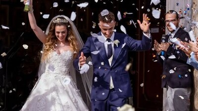 Jota and Cardoso exiting their wedding ceremony with wide grins, love in their hearts and confetti in the air. ( diogoj_18/ Instagram)